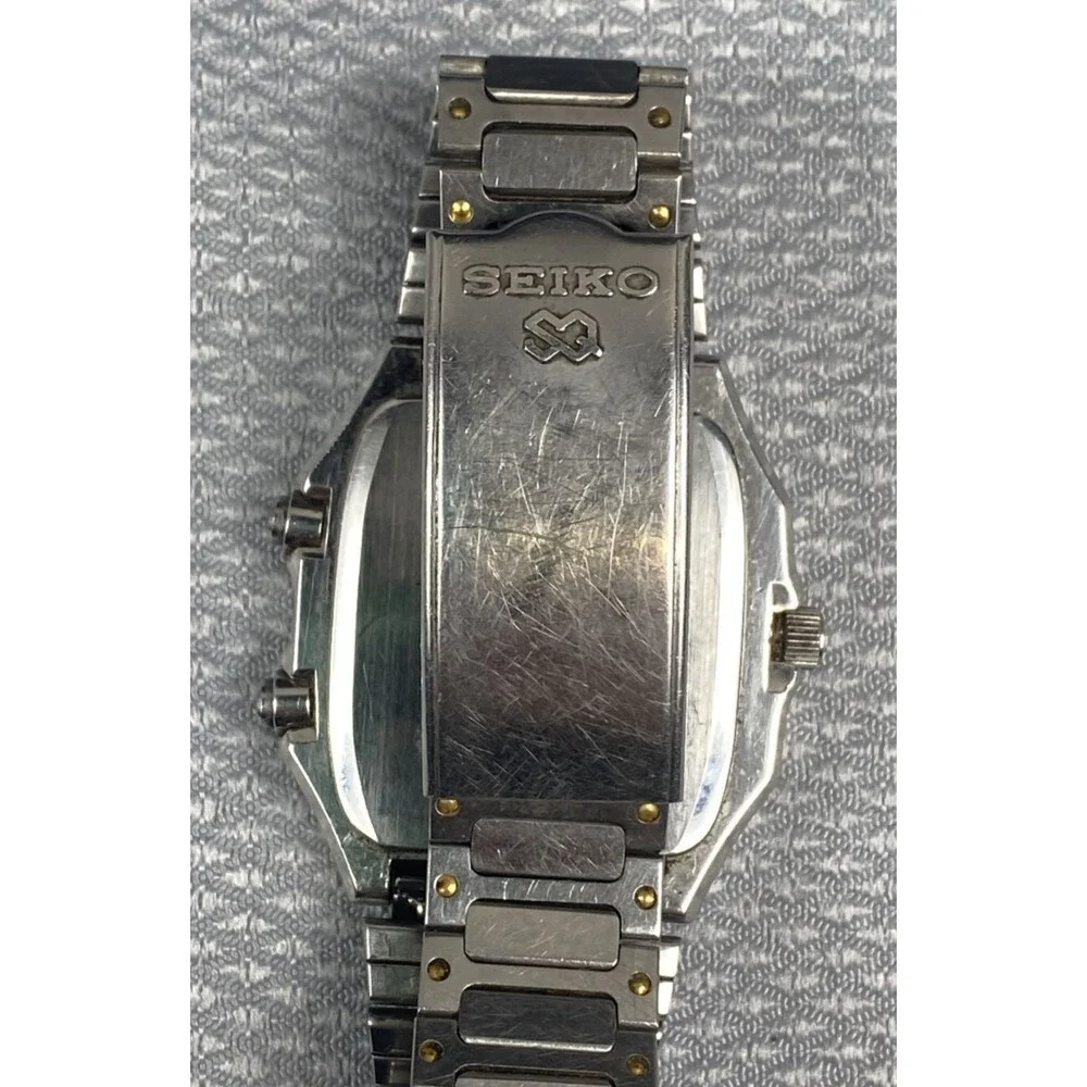 vintage Seiko Sports 100 Alarm watch H557-5179 Original Tag and band parts AS/IS